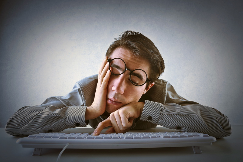 2K, sleeping on keyboard, indoors, business, contemplation, furniture, sitting, table, typical programmer, business person, males, front view, hand, headshot