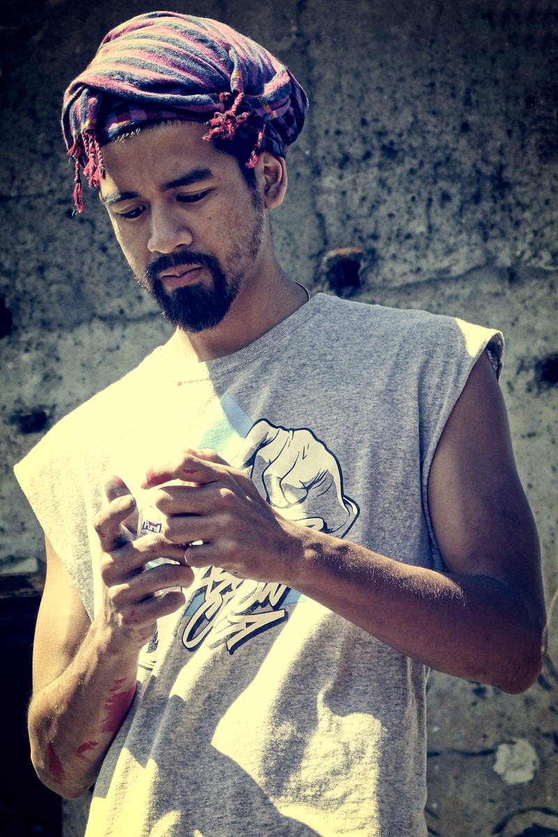 lifestyles, leisure activity, men, tattoo, focus on foreground, street, cambodia, outdoors, kampot, casual clothing, beard, day, preah monivong bokor national park