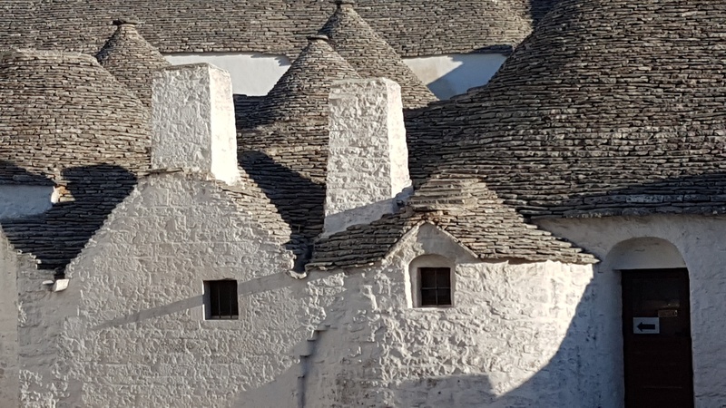 outdoors, day, bari province, italy, low angle view, religion, architecture, nature, dry stone, window, wall, trullo, building, the past, no people, travel destinations