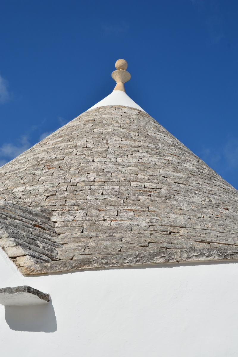 winter, travel destinations, outdoors, clear sky, building exterior, trulli, nature, alberobello, the past, mountain, history, blue, travel, built structure