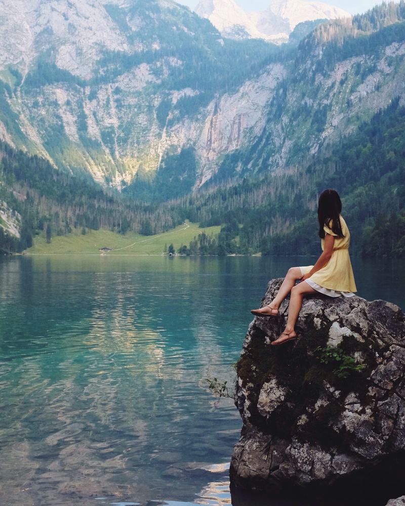 travel, leisure, mountain range, person, lifestyles, sunny, tranquility, scenics - nature, water, hairstyle, real people, body, solid, lake, tree, tranquil scene