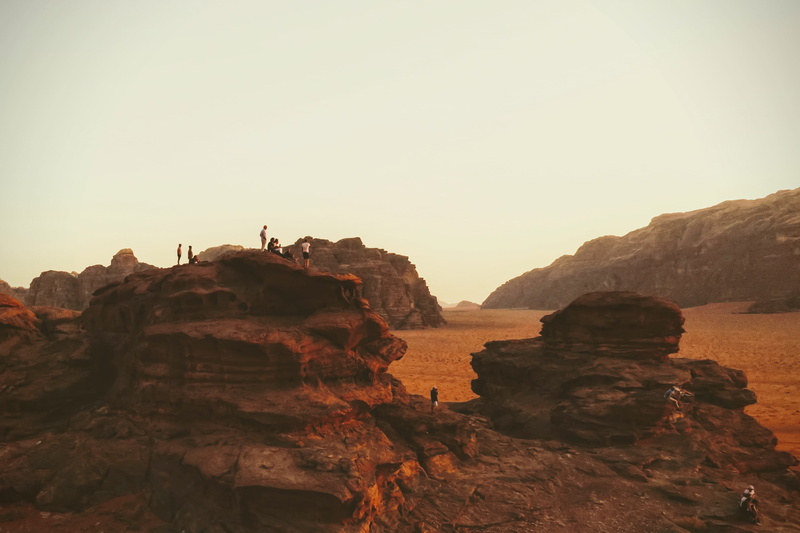 red, tranquil scene, land, sand, cliff, non-urban scene, sea, leisure activity, mar, tranquility, sunset, solid, eroded, scenics - nature, rock formation