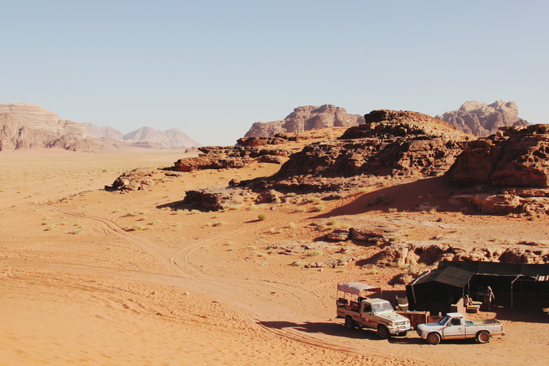 sand, beauty in nature, no people, nature, truck, climate, environment, solid, desert, rock formation, rock - object, wadi rum village, hike, rock, land