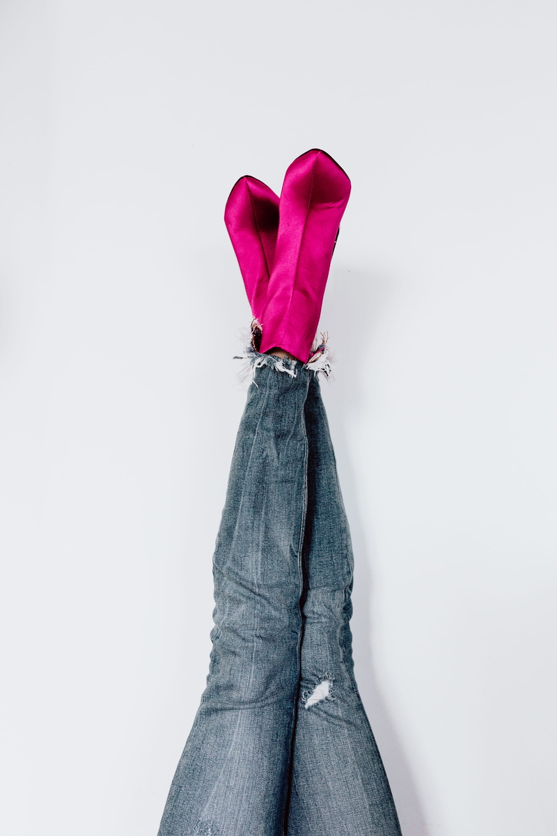 unrecognizable person, lifestyles, blue, studio shot, blues jeans, women, textile, fashion, personal perspective, one person, pink, human body part, real people