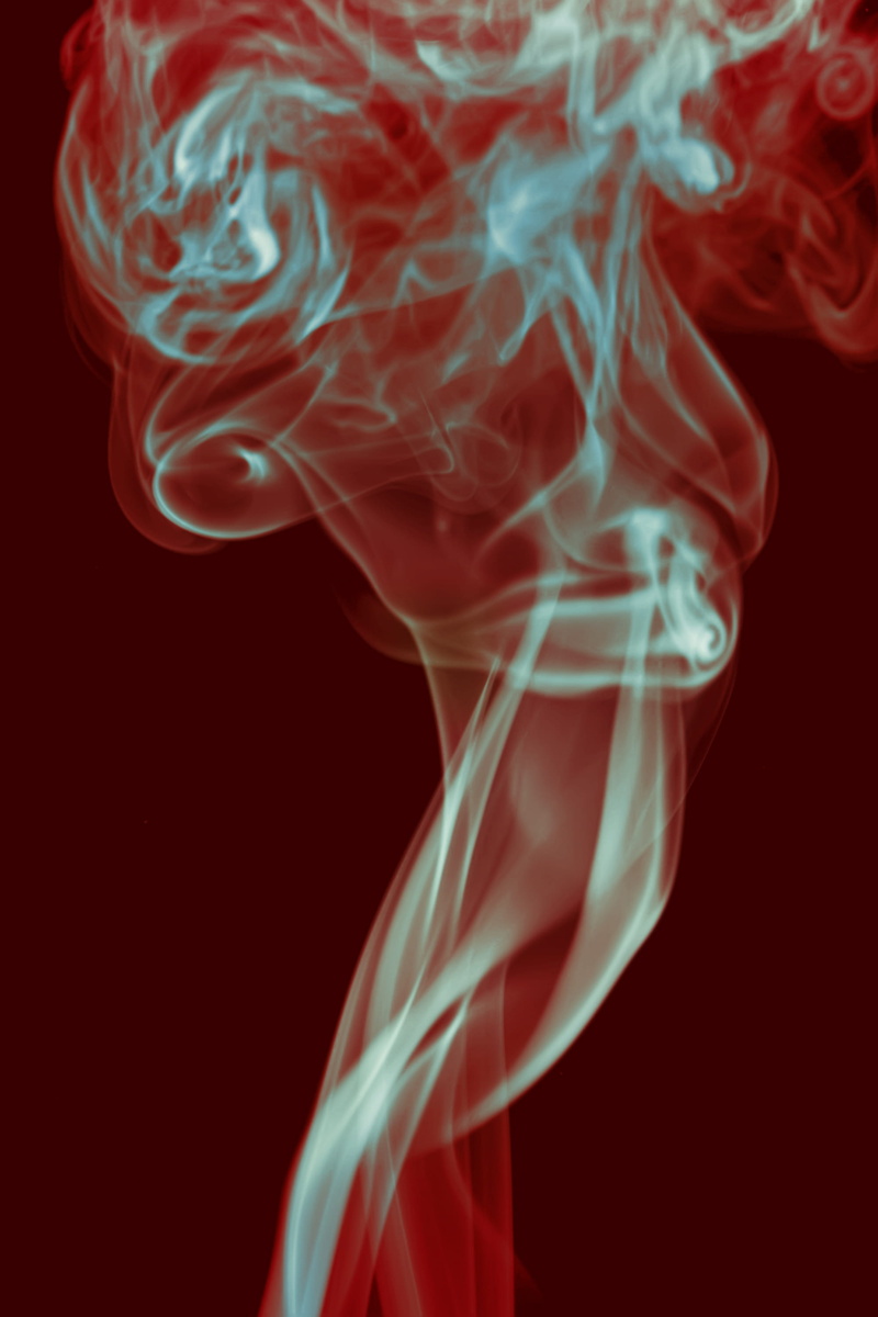 multi colored, natural pattern, motion, no people, nature, abstract, flowing, black background, burning, close-up, aromatherapy, copy space, pollution
