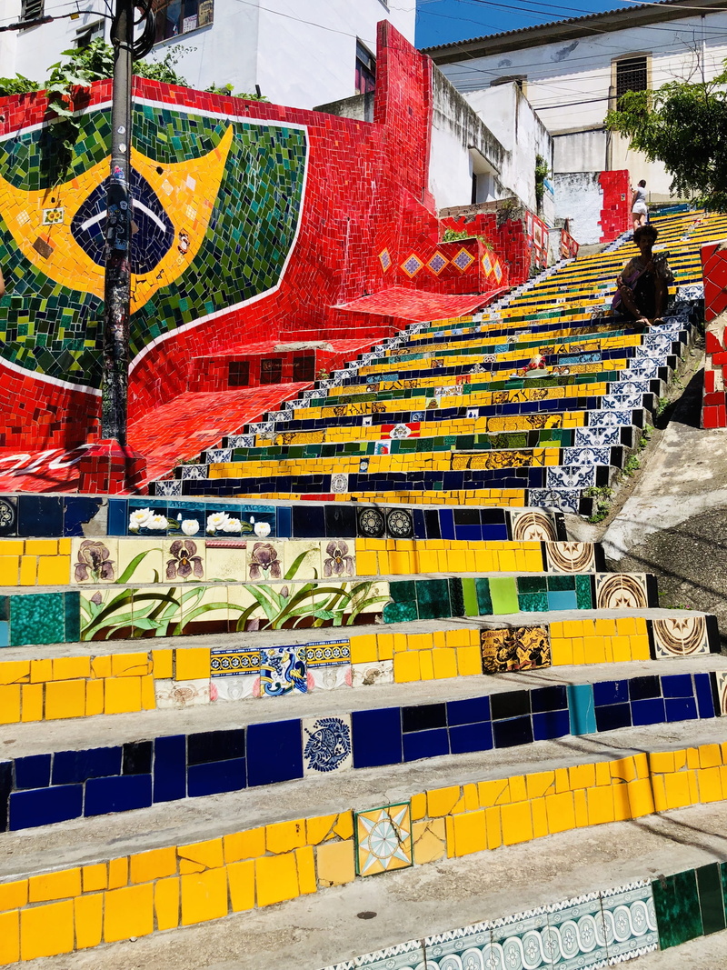 santa teresa, handrail, sunlight, no people, steps, asphalt, person, steps and staircases, wall, staircase, painting, banister, graffiti, human, day, r. manuel carneiro