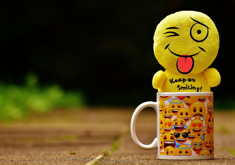 close-up, focus on foreground, face, inside, emotions, sly fox, wink, refreshment, emotion, yellow, emoticon, mug, creativity, happiness, smiling, humor