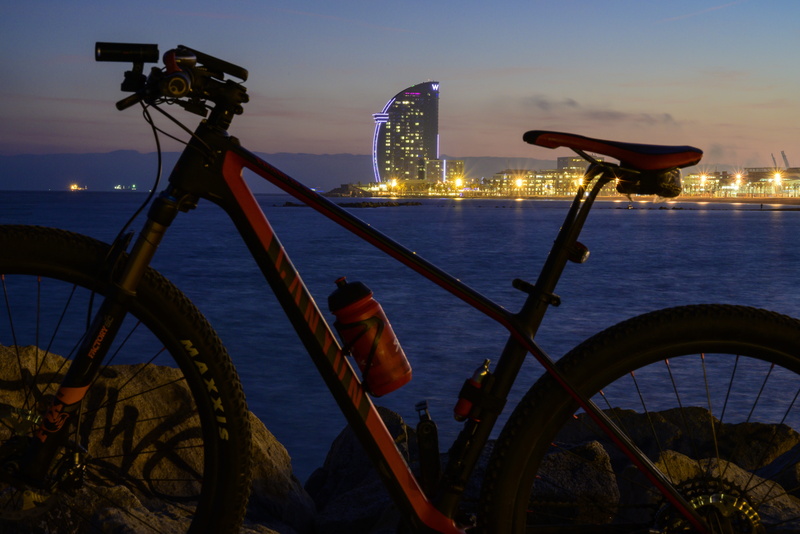 urban, land vehicle, wheel, dusk, no people, restaurant, tire, bicycle, blue, photography themes, outdoors, lighting equipment, windows, reflection, only