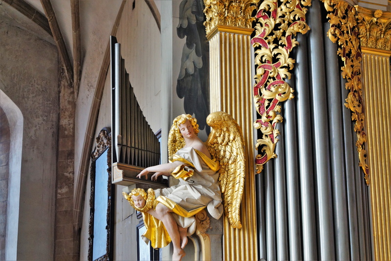 female likeness, outdoors, statue, no people, building exterior, freiberger dom, ornate, gold colored, creativity, 5K, craft, representation, building