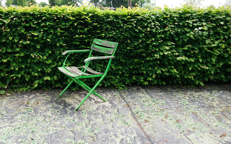high angle view, garden furniture, chairs, no people, empty, growth, paving stone, garden chair, day, chair, recovery, footpath, table, plant part, cozy
