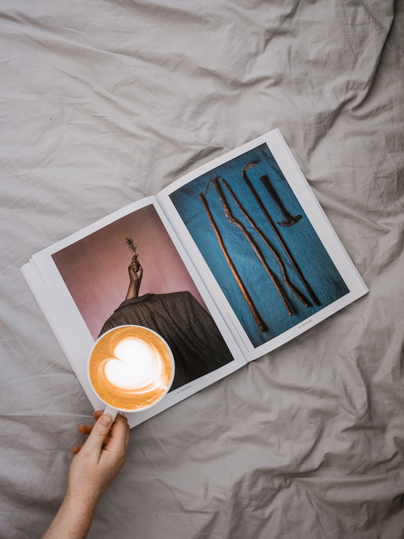 directly above, hand, home decor, plant, human body part, cappuccino, lifestyles, vegetable, leisure activity, advertisement, textile, one person, canvas