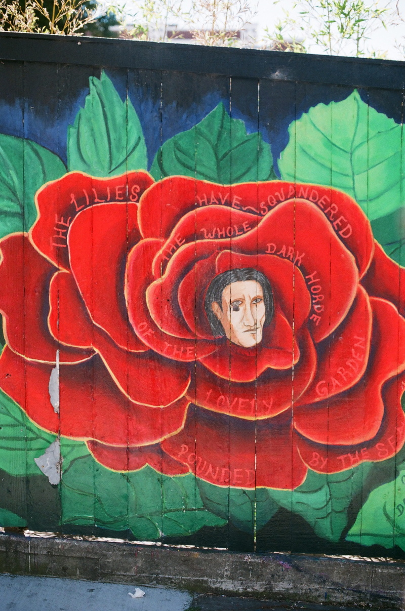 mural, poster, modern art, graffiti, looking at camera, ornament, red, painting, religion, sculpture, paint container, representation, teal, no people