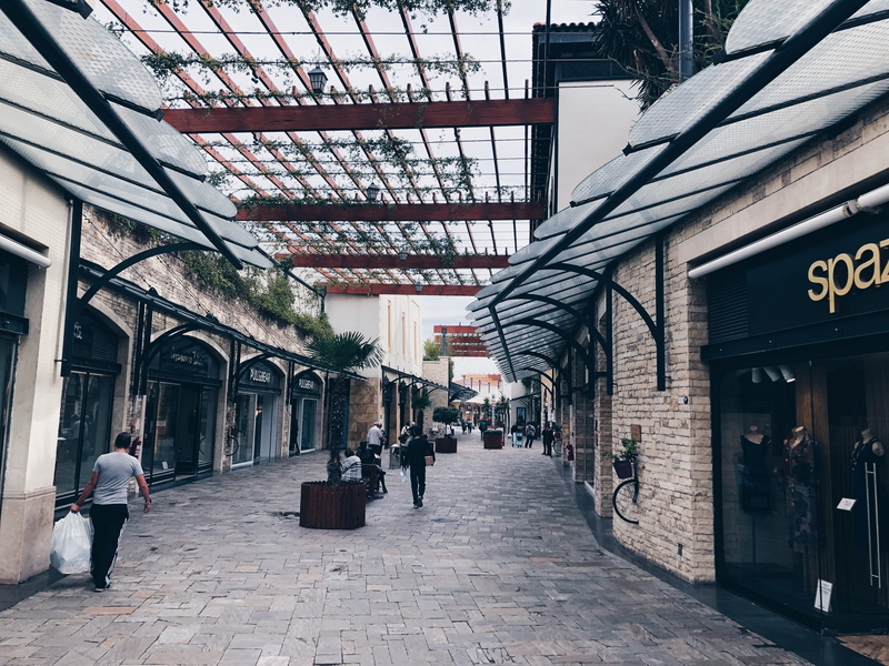shopping, buildings, urban, commerce, shops, incidental people, building, women, group, group of people, outdoors, road, architecture, tiled floor, fashion