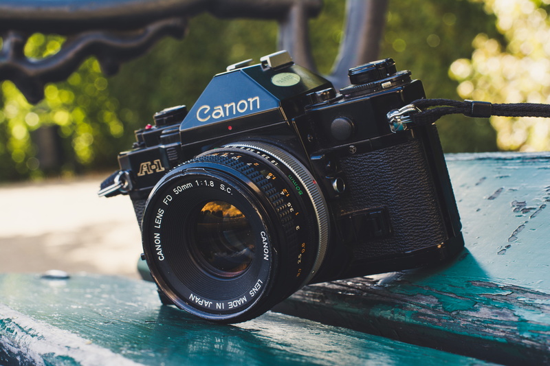 no people, western script, photographic equipment, text, canon a1, canon, digital camera, modern, technology, activity, day, close-up, nature, slr camera