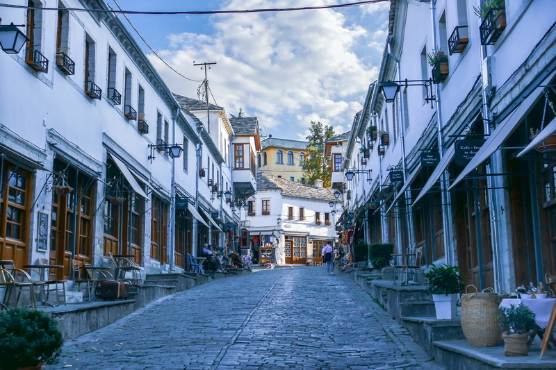 building exterior, incidental people, unesco, travel, europe, nature, house, building, sky, outdoors, built structure, history, transportation, tower, footpath
