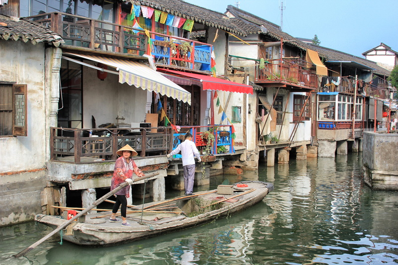 architecture, women, real people, neighborhood, city, vessel, canoe, town, lifestyles, built structure, watercraft, waterfront, nature, riding, 2K, urban