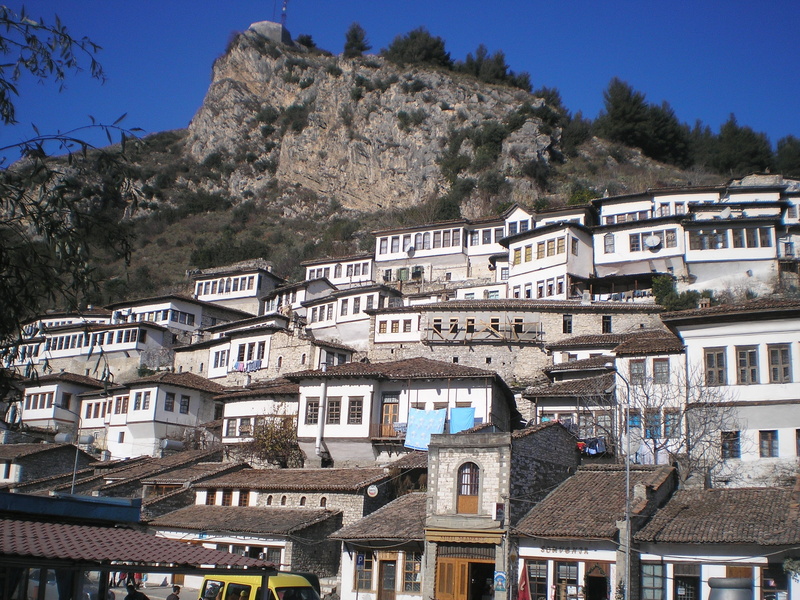 mountain, history, city, building, town, house, balkan, window, europe, day, clear sky, building exterior, apartment, 2K, sunlight, no people, sky, albania