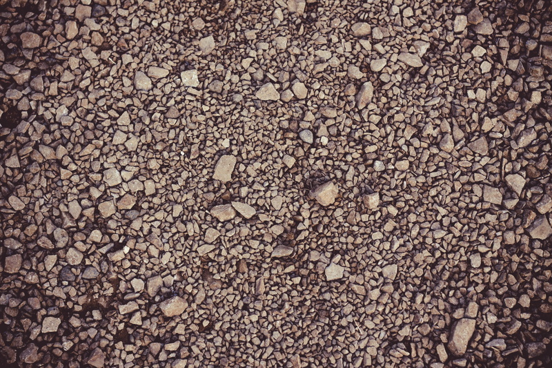land, solid, dark, rock, no people, beach, ground, close-up, rocks, large group of objects, rough, design, stone - object, gravel, floor, abstract, textured effect