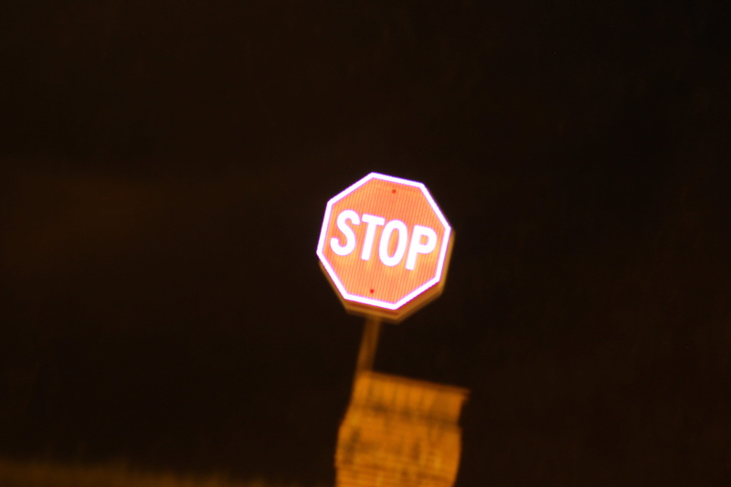communication, warning sign, road, sign, black, road sign, white, black background, nature, stop sign, dark, red, guidance, night, copy space, text, capital letter