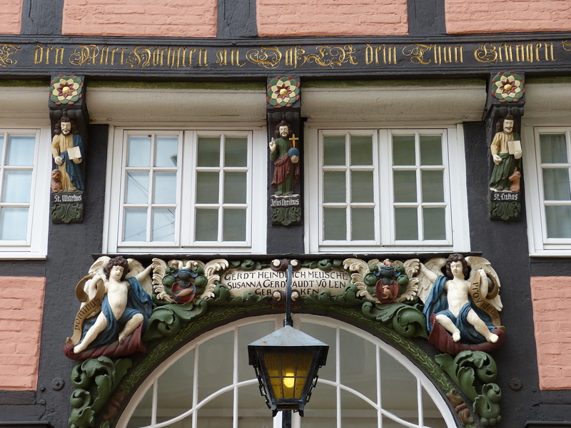 christ, craft, lighting equipment, ornate, built structure, jesus, human representation, day, entablature, bar, representation, statue, entrance, carving