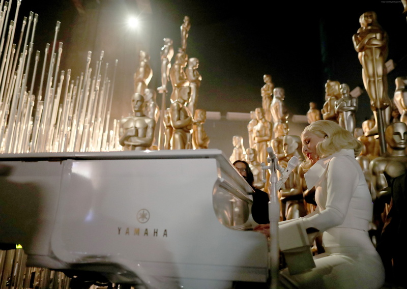 human representation, adult, sitting, holding, women, casual clothing, Lady Gaga, Oscar 2016, representation, people, museum, history, standing, arts culture and entertainment