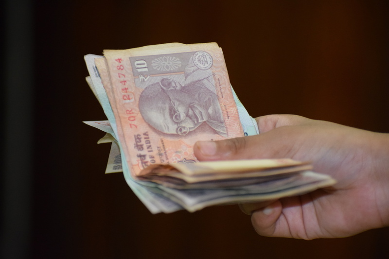 finance, 5K, holding, paper currency, adult, rupees, currency, wealth, consumerism, economy, tax, colored background, one person, india, indoors, human body part