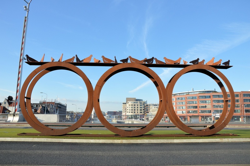 metal work, creativity, art, statue, no people, water, day, shape, creative, built structure, clear sky, city, road, geometric shape, transportation, construction