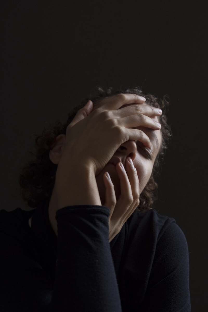 shadow self, darkness, emotion, black background, depression - sadness, despair, emotive, front view, sadness, eyes closed, dark, hands, human face, adult