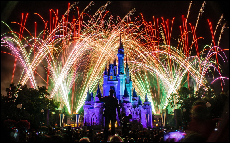 large group of people, Sleeping Beautys Castle, paris, arts culture and entertainment, event, celebration, crowd, fireworks, night, built structure, disney