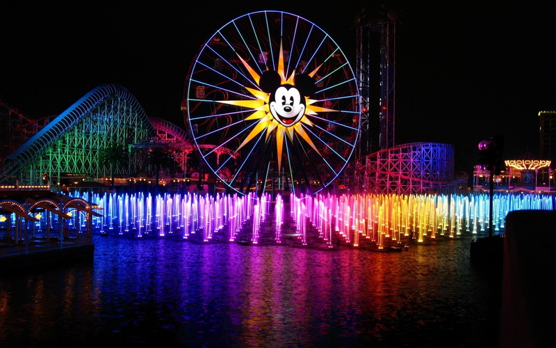 city, amusement park ride, arts culture and entertainment, travel destinations, outdoors, building exterior, built structure, multi colored, disney, waterfront