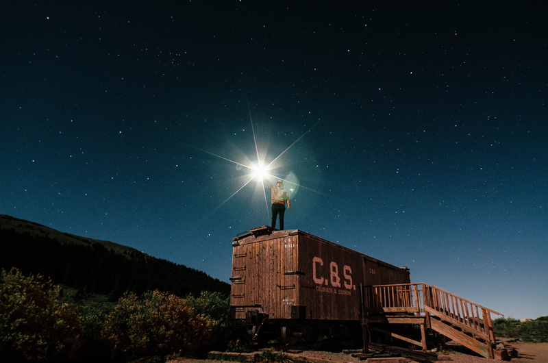 tower, star - space, cargo, outdoors, adventure, constallation, built structure, architecture, trailer, building exterior, train, person, beauty in nature