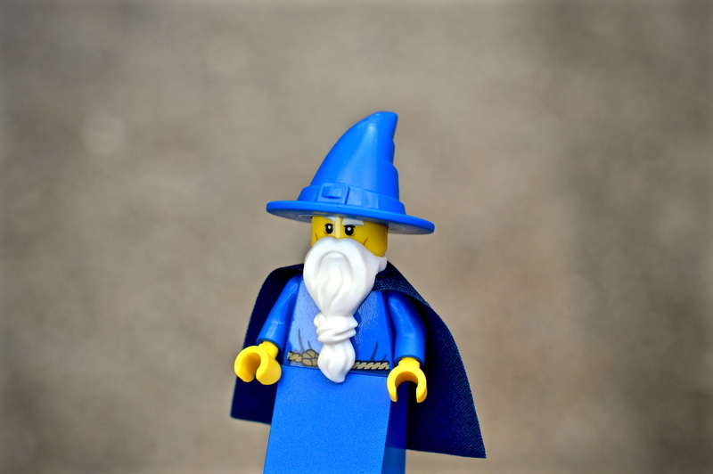 single object, sorcerer, wizard, male, robe, wall - building feature, copy space, witch, blue, toy, beard, close-up, robot, sorcery, creativity, figurine