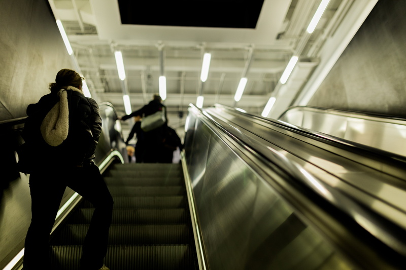 futuristic, travel, moving, steps and staircases, architecture, illuminated, subway Station, staircase, railing, walking, city Life, technology, women