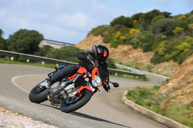 750, motion, mode of transportation, sports helmet, riding, motorcycle, unrecognizable person, shiver, day, extreme sports, one person, plant, nature, helmet