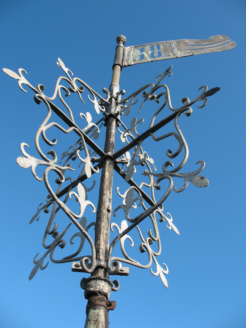ornament, outdoors, weathervane, blue, clear sky, architecture, old, communication, design, weather vane, historically, direction, sunlight, day, nature