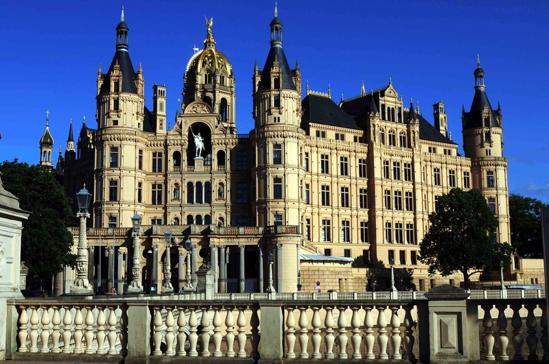 no people, spire, low angle view, city, nature, castle, outdoors, government, blue sky, architecture, travel, sky, facade, built structure, travel destinations