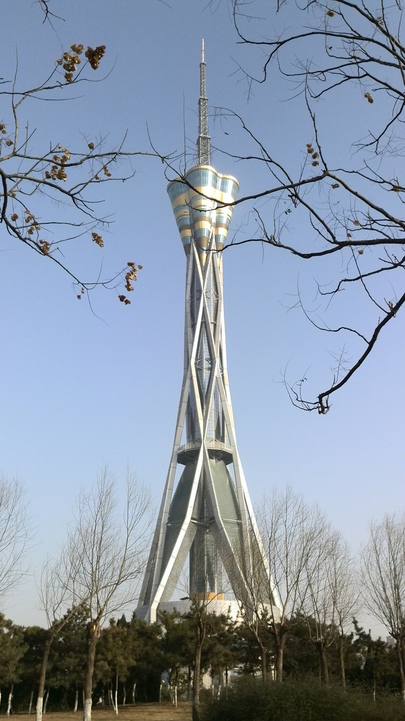 metal, clear sky, henan tv station, low angle view, fu in henan province, autumn, outdoors, sky, blue, bare tree, built structure, lighting equipment, land