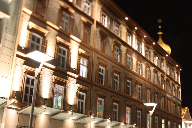 brown, city life, building exterior, in a row, illuminated, built structure, cladding, night, no people, lighting equipment, architecture, residential district