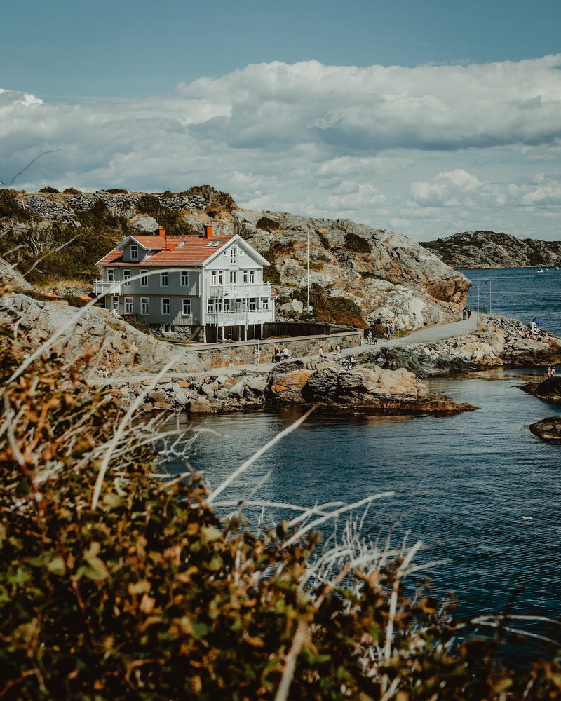 scenics - nature, house, building exterior, sea, water, mountain, rocks, sweden, 2K, architecture, residential district, sky, no people, built structure