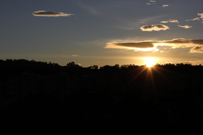 tree, lens flare, orange color, sunbeam, silhouette, sun, cloud - sky, no people, dark, bogotá, sunset, tranquil scene, bogota, outdoors, environment, colombia