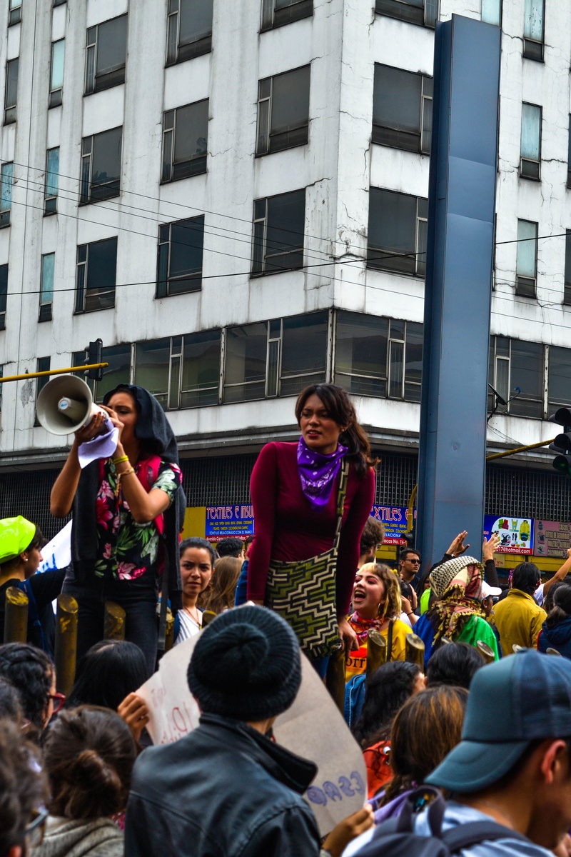 bogota, group of people, architecture, large group of people, sitting, colombia, adult, event, arms raised, fun, outdoors, women, building, built structure