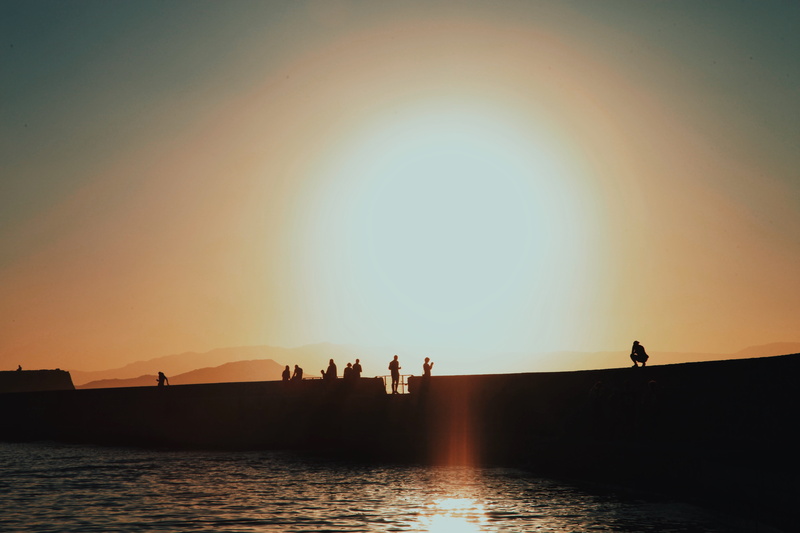 night, evening, leisure activity, clear sky, outdoors, contrast, sea, sky, chania, tranquil scene, silhouette, medium group of people, lifestyles, people