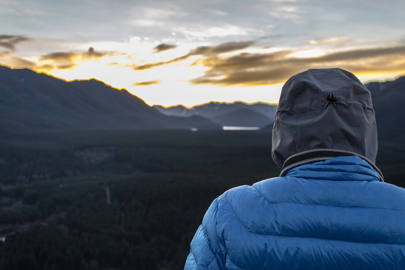 warm clothing, outdoors, headshot, clouds, hood - clothing, one person, cloud - sky, sunset, 5K, standing, real people, winter, men, mountains, beauty in nature