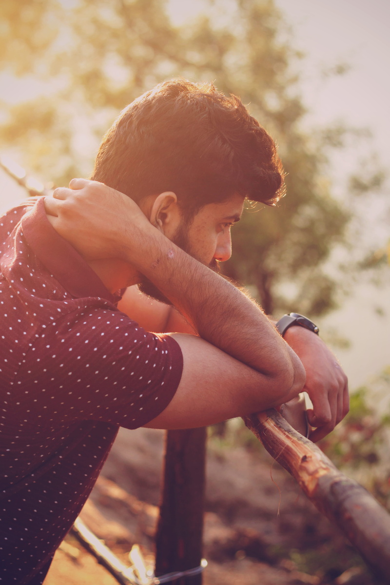 lifestyles, hunk, hills, innocence, nature, childhood, light, sitting, hilltop, arm, tree, looking, flare, plant, make out, sunkissed, outdoors, real people