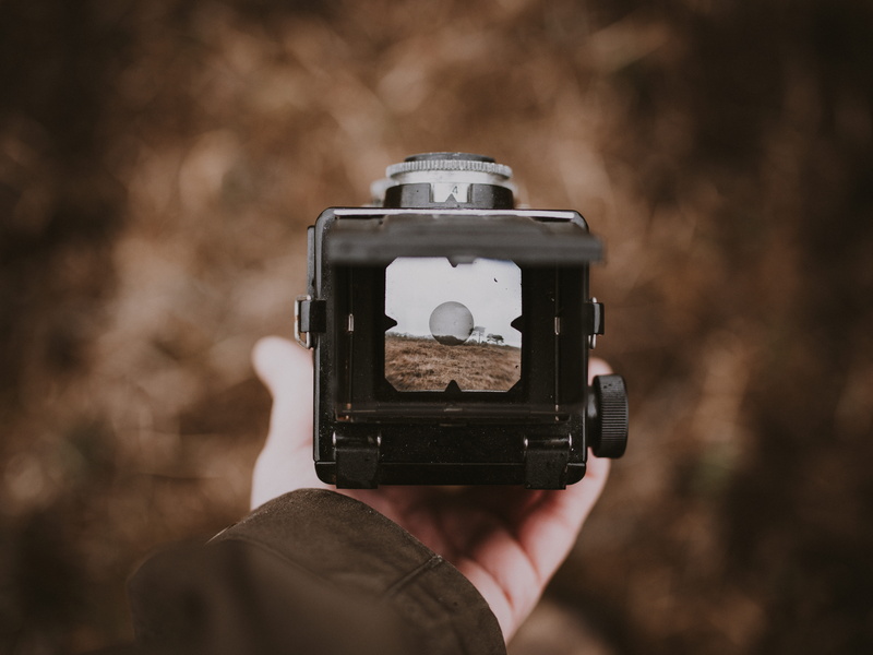 real people, human hand, camera lens, close-up, screen, focus, stitch, activity, wristwatch, hand, lcd screen, photography, human, finger, adult, black