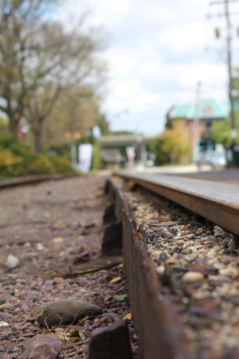 railroad track, cloud - sky, transportation, focus on foreground, diminishing perspective, sky, close-up, metal, tracks, urban, the way forward, railroad