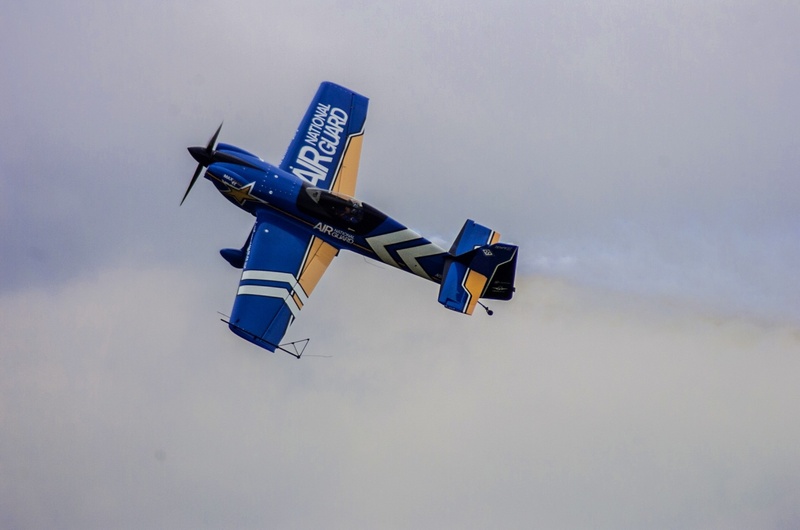 low angle view, no people, day, transportation, cloud - sky, guidance, plane, sign, outdoors, loud, symbol, big, airshow, fast, motion, kid, nature, air vehicle