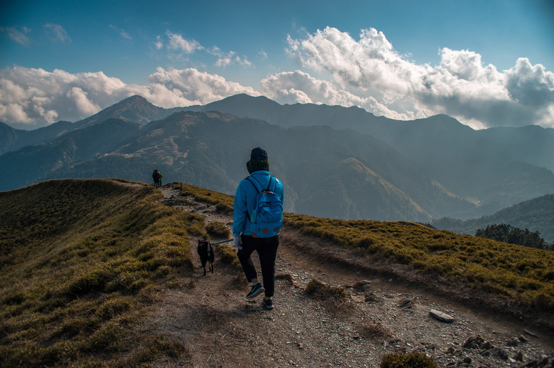full length, lifestyles, outdoors, ground, road, peak, gravel, rear view, hehuan mountain, human, sky, landscape, trip, dirt road, apparel, mountain, hiking