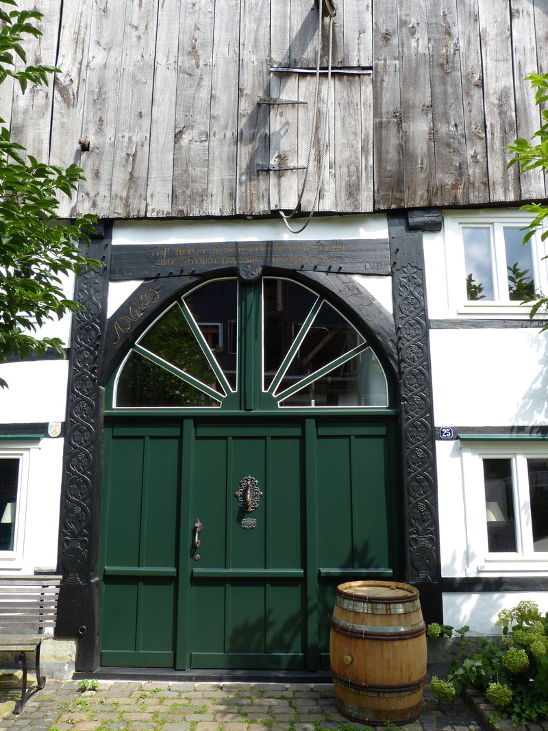 built structure, building, building exterior, house, outdoors, residential district, old town, goal, door, wood, closed, no people, window, truss, nature