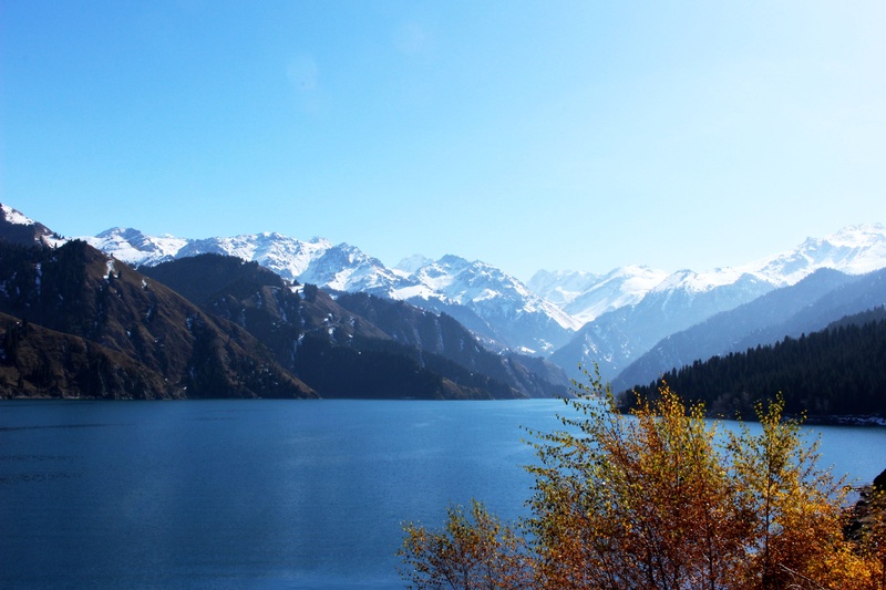 mountain range, lake, cold temperature, mountain, non-urban scene, tranquil scene, idyllic, snowcapped mountain, sky, nature, plant, tranquility, blue
